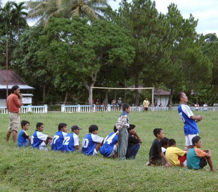 Soccer players standing by